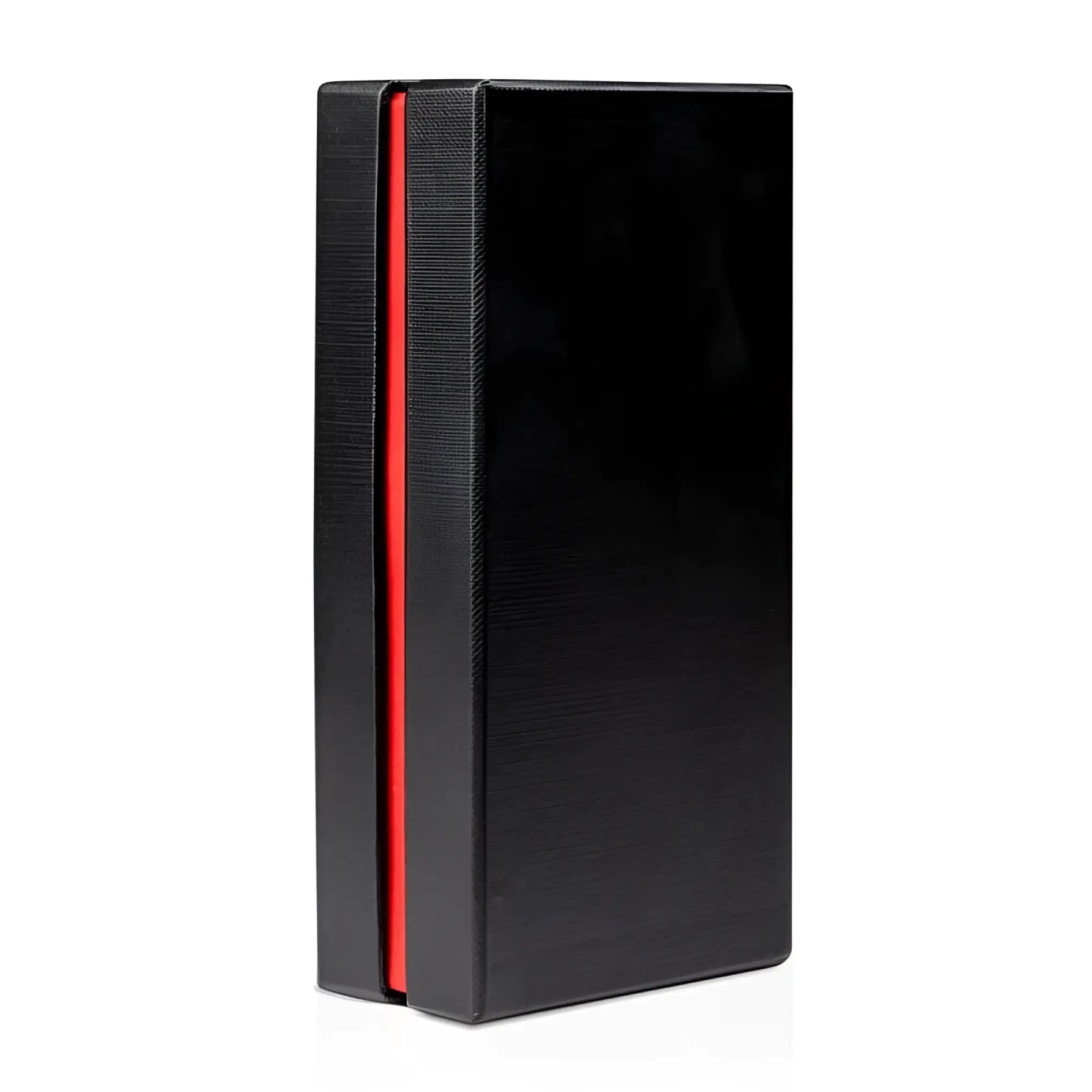 Black textured notebook with vibrant red inner lining along spine shown alongside sinner drang fun metal anal plug silver