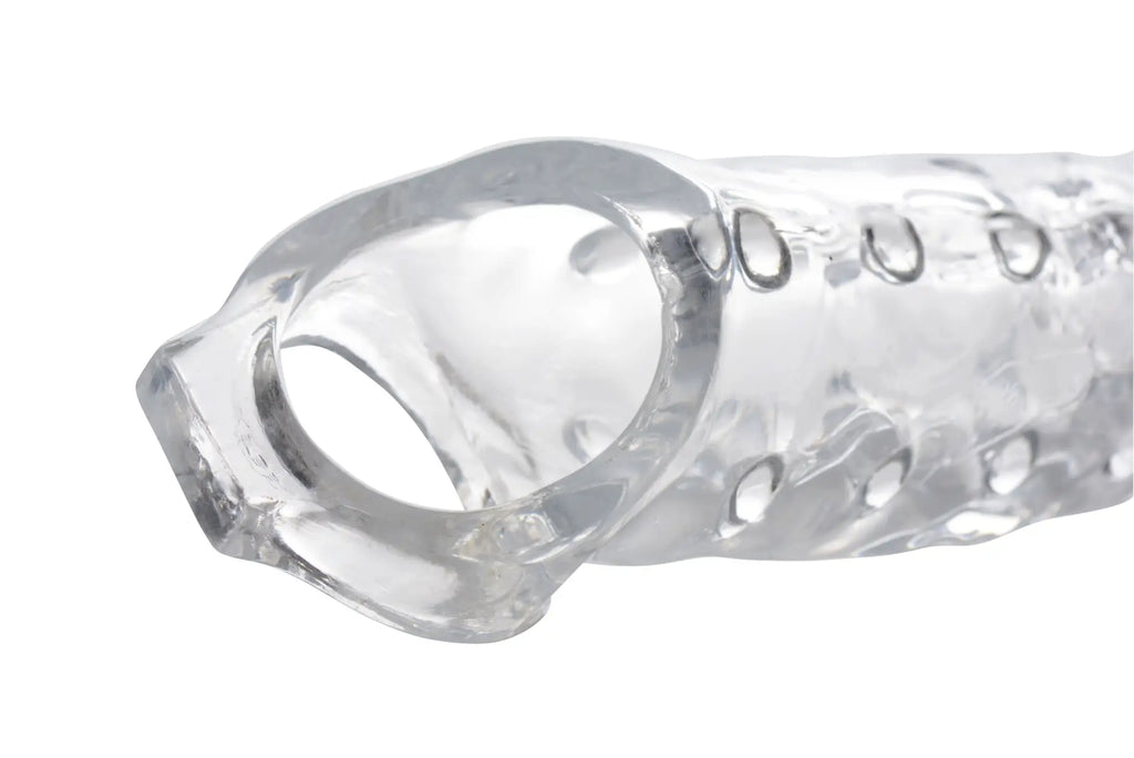 Clear textured silicone cock ring with smooth transparent finish and embossed circular patterns size matters 3in extender sleeve clear