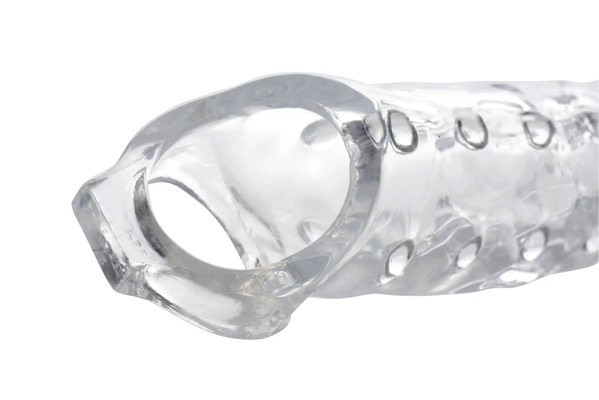 Clear textured silicone cock ring with smooth transparent finish and embossed circular patterns size matters 3in extender sleeve clear