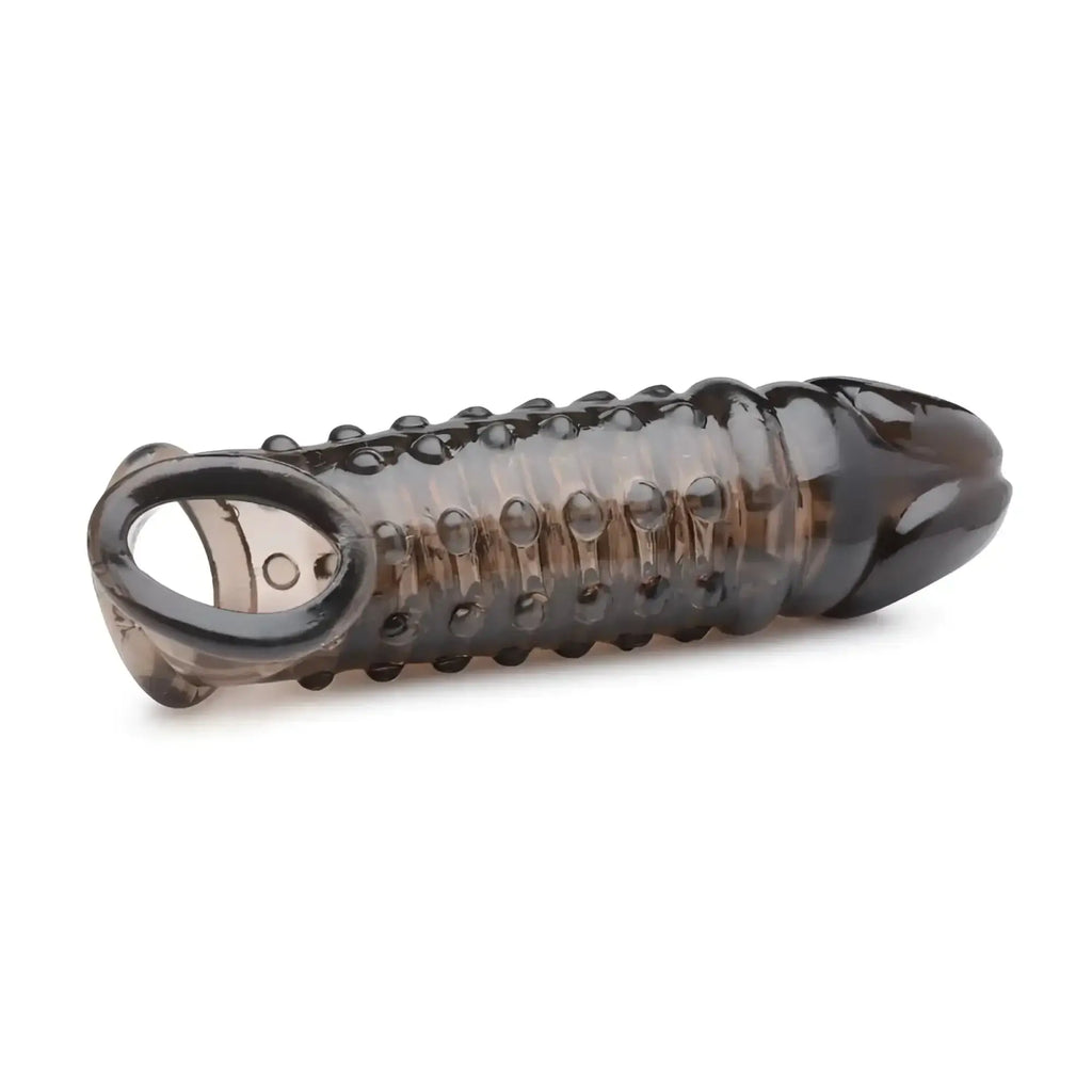 Transparent dark gray silicone cock ring with textured ridges and circular opening.