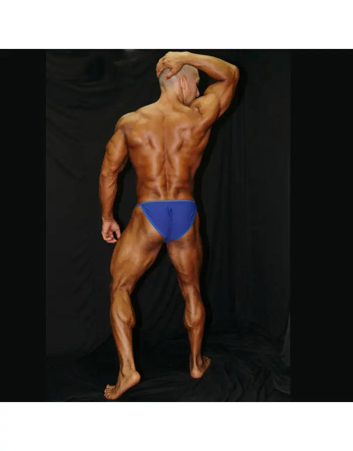 Blue bikini underwear by Arroyman featuring a snug fit and minimal coverage shown on a model from the back.