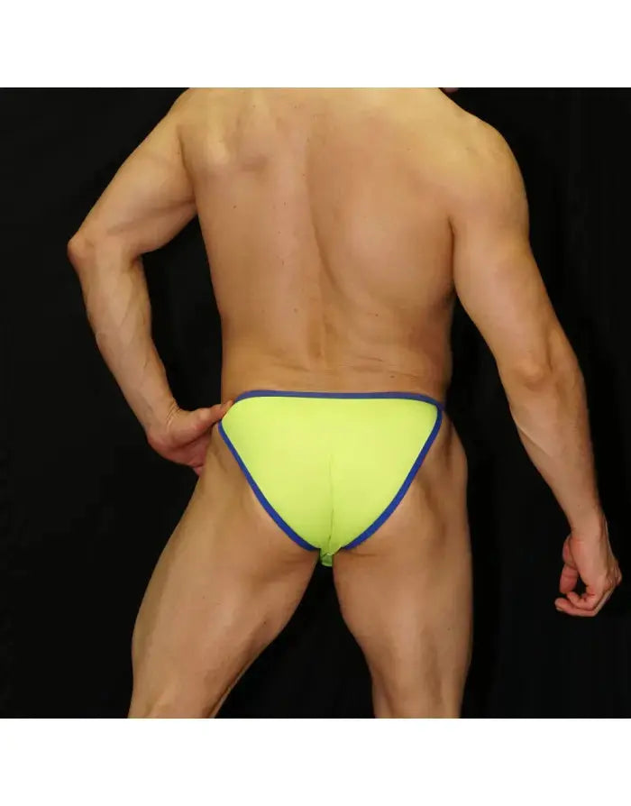 Neon blue bikini underwear by Arroyman featuring a low-rise cut and contrasting trim shown on a model from the back.