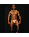 Arroyman men's sling bikini in orange and red featuring a minimal design and adjustable side ties modeled by a muscular man.