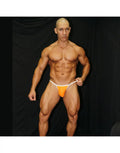 Arroyman men's bikini underwear in bright orange ribbed fabric featuring a white waistband modeled by a man.