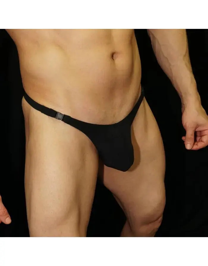 Black thong underwear with a buckle detail made of soft fabric shown on a model by Arroyman.