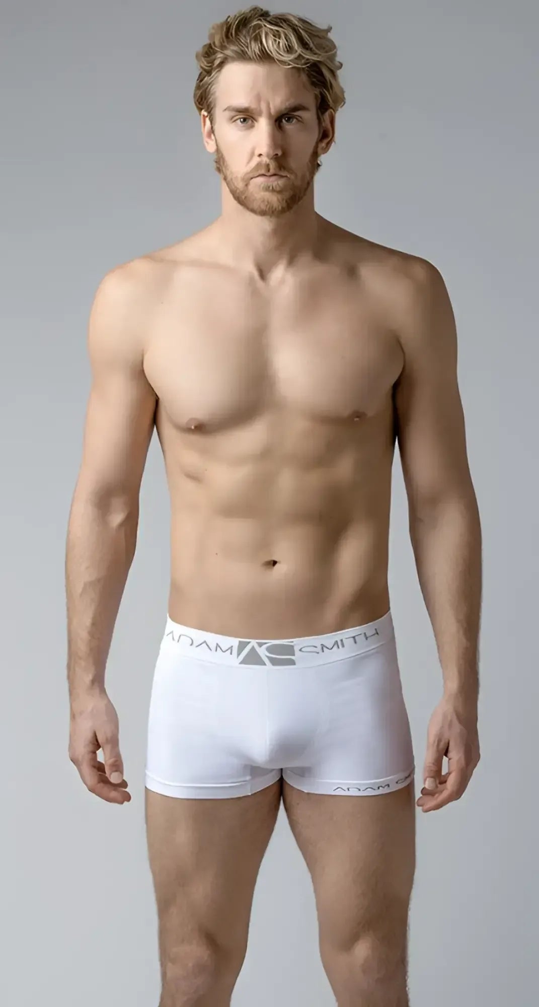 White menâs boxer briefs softest short trunks with gray elastic waistband featuring adam smith logo