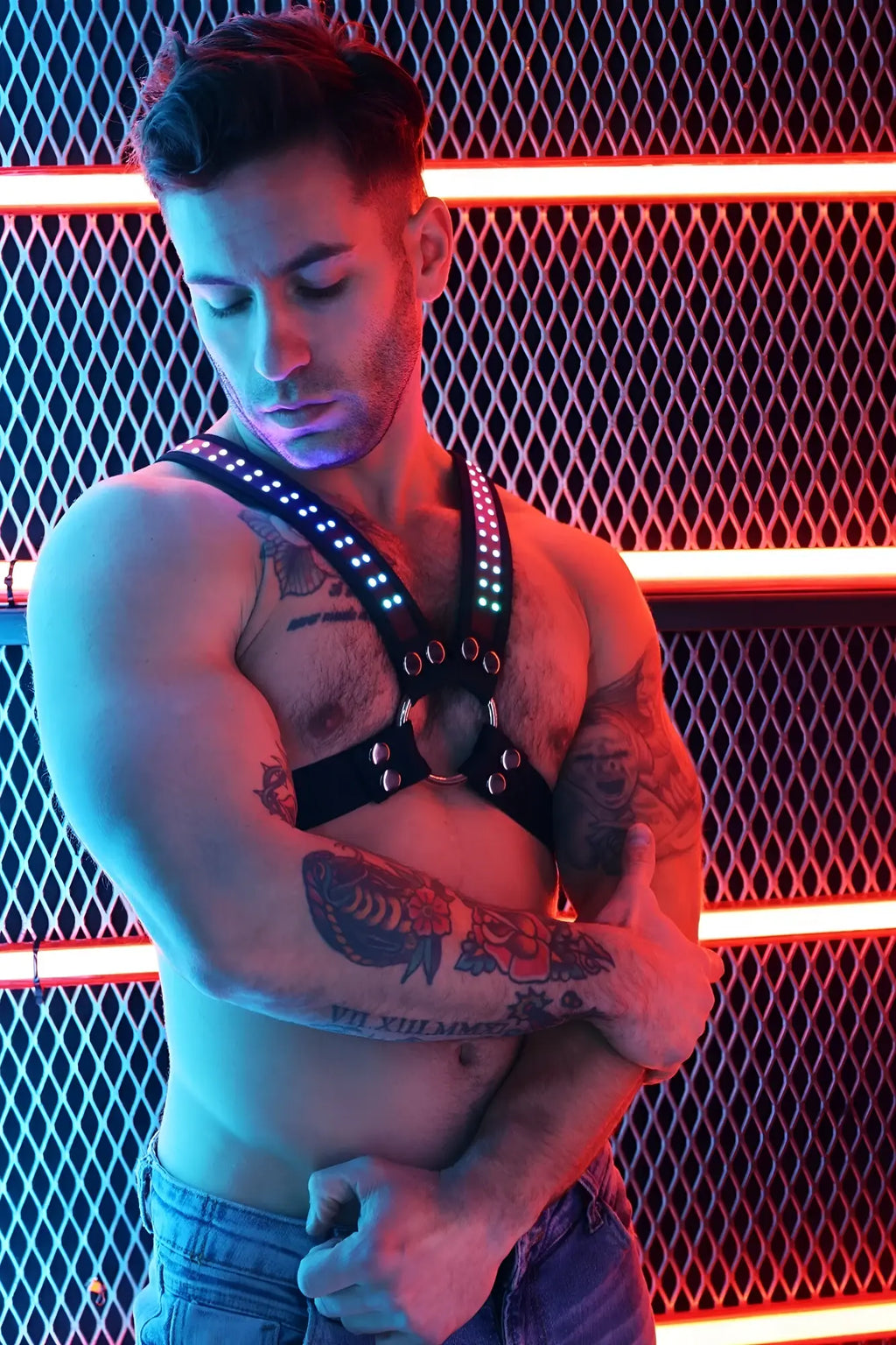 Black leather soundwave cross harness with glowing led lights and metallic hardware for bold style