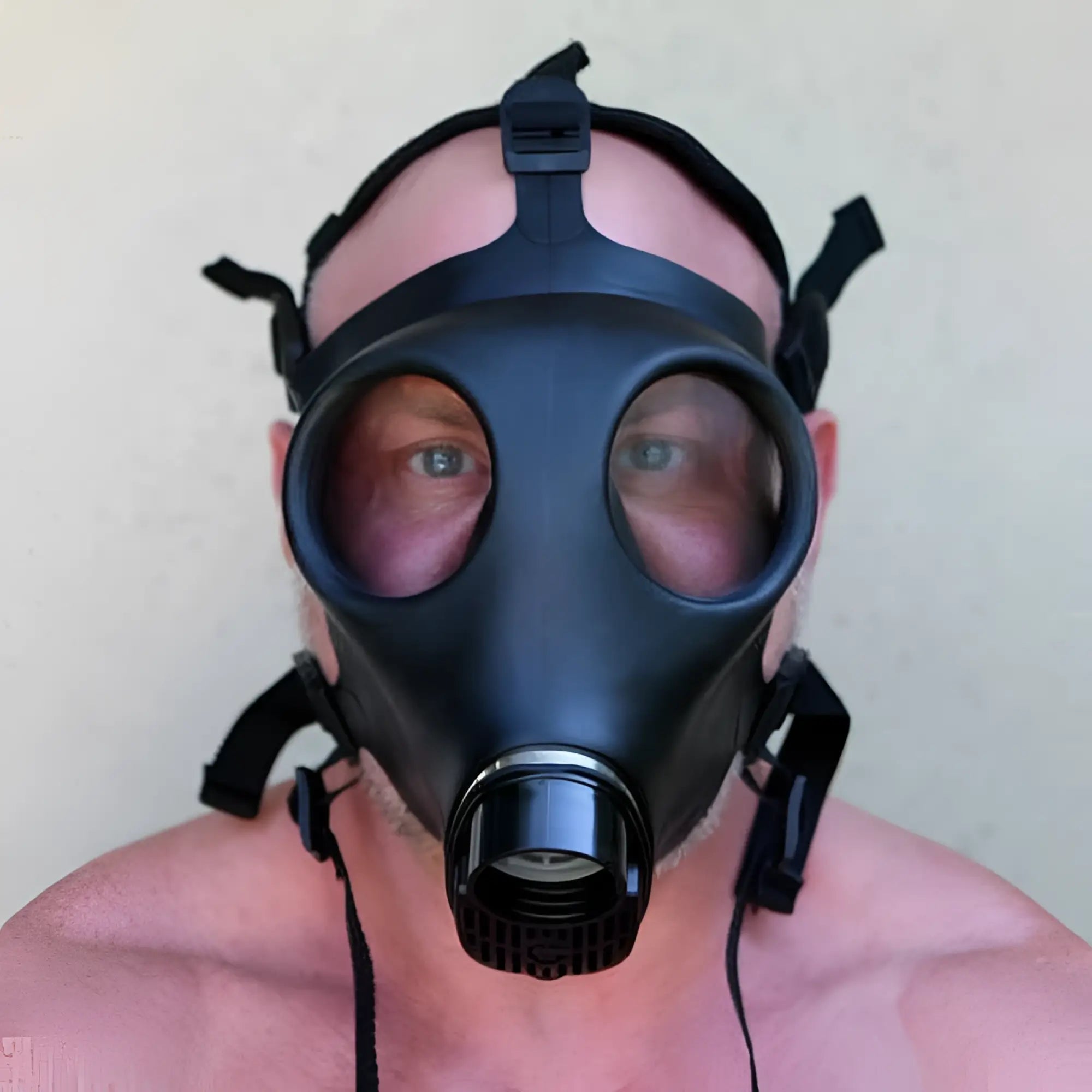 Sport Fucker adjustable black rubber gas mask with central filter housing and adjustable straps for secure fit