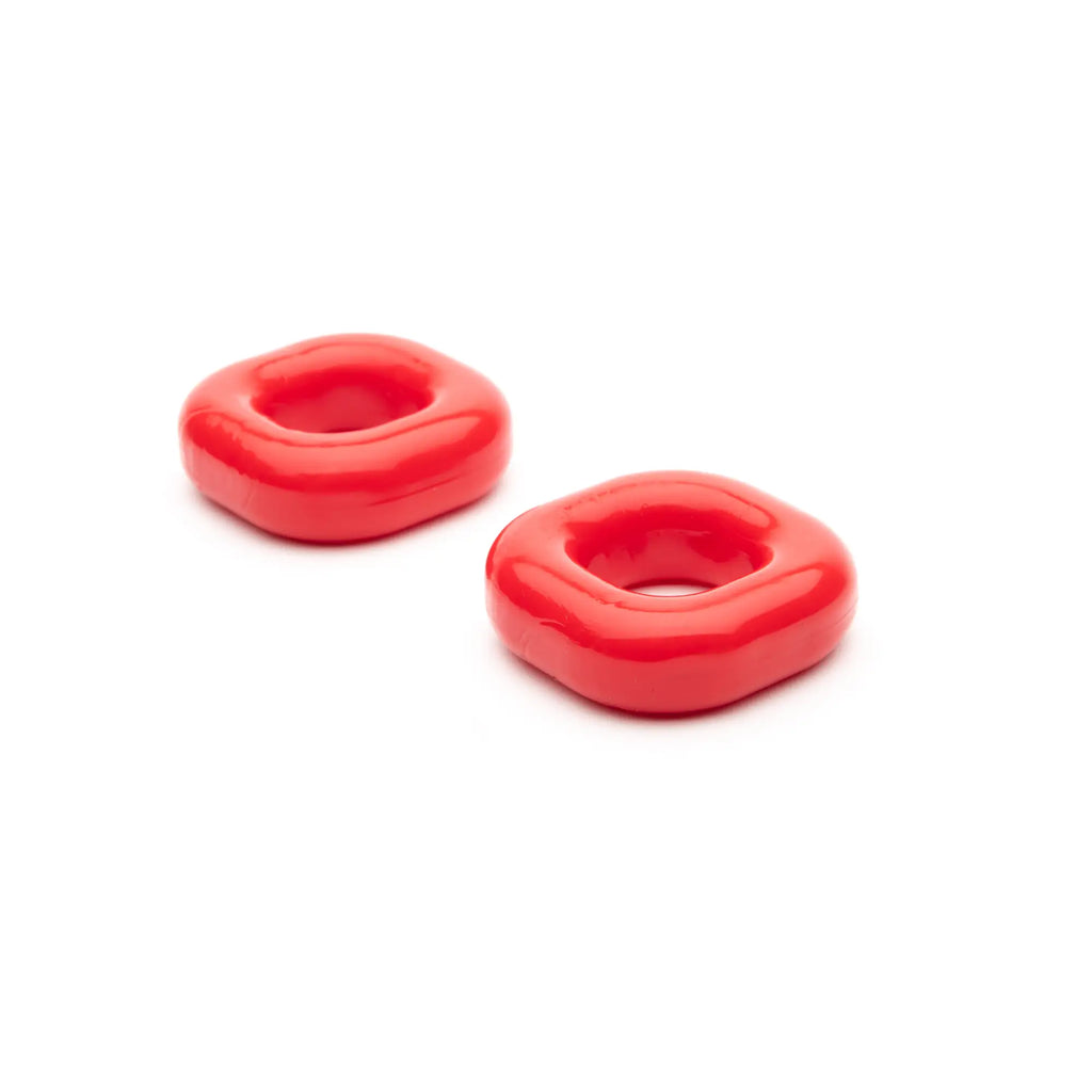 Two vibrant red glossy square-shaped ring beads with rounded edges from sport fucker boner expansion pack red