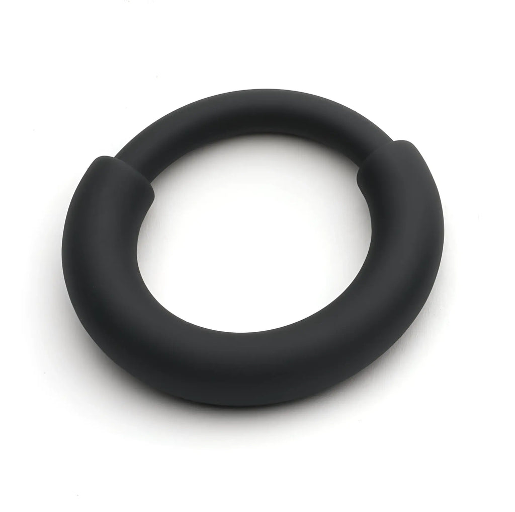Black silicone sport fucker boost fusion ring with smooth matte finish and rounded edges designed for active use