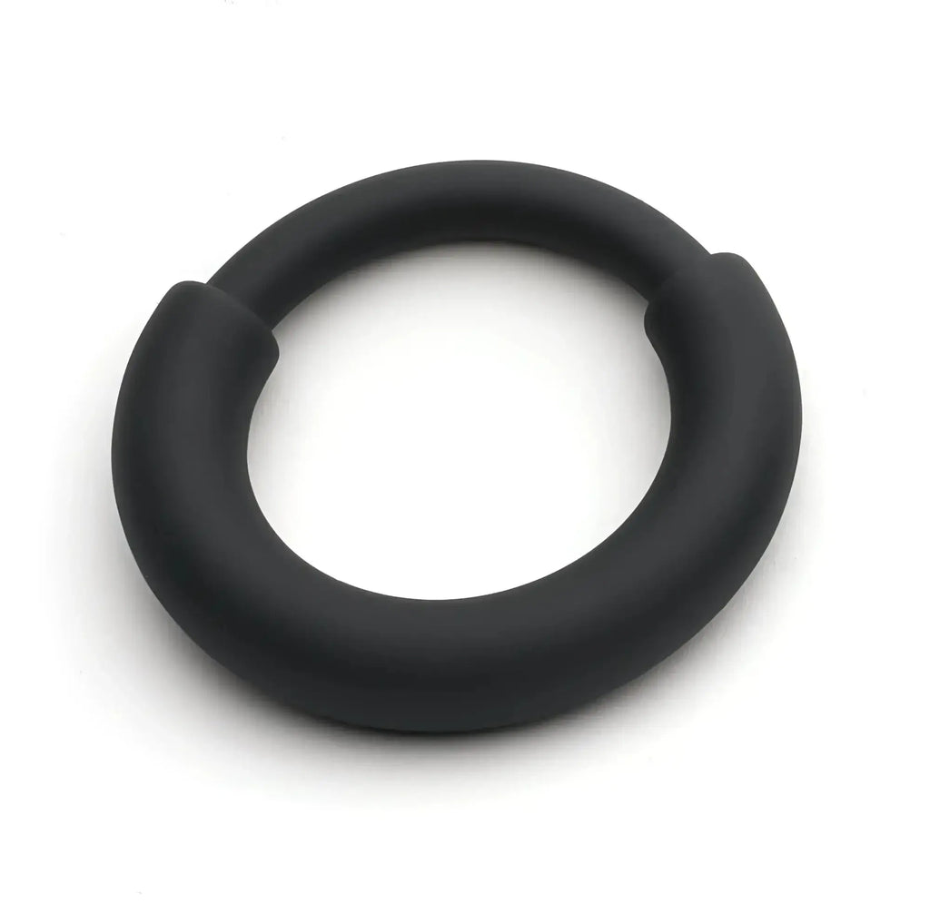 Black silicone sport fucker boost fusion ring with smooth matte finish and rounded edges designed for active use