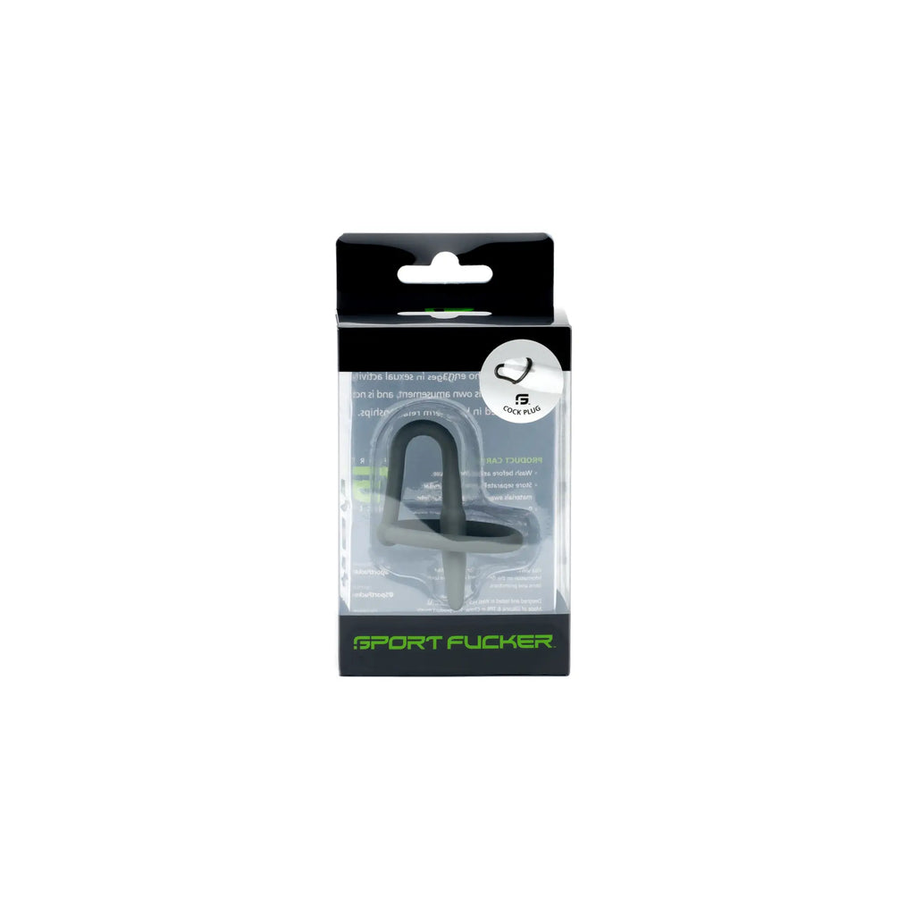 Black plastic Sport Fucker cock plug in clear packaging with green branding for sports use by Sport Fucker Grey