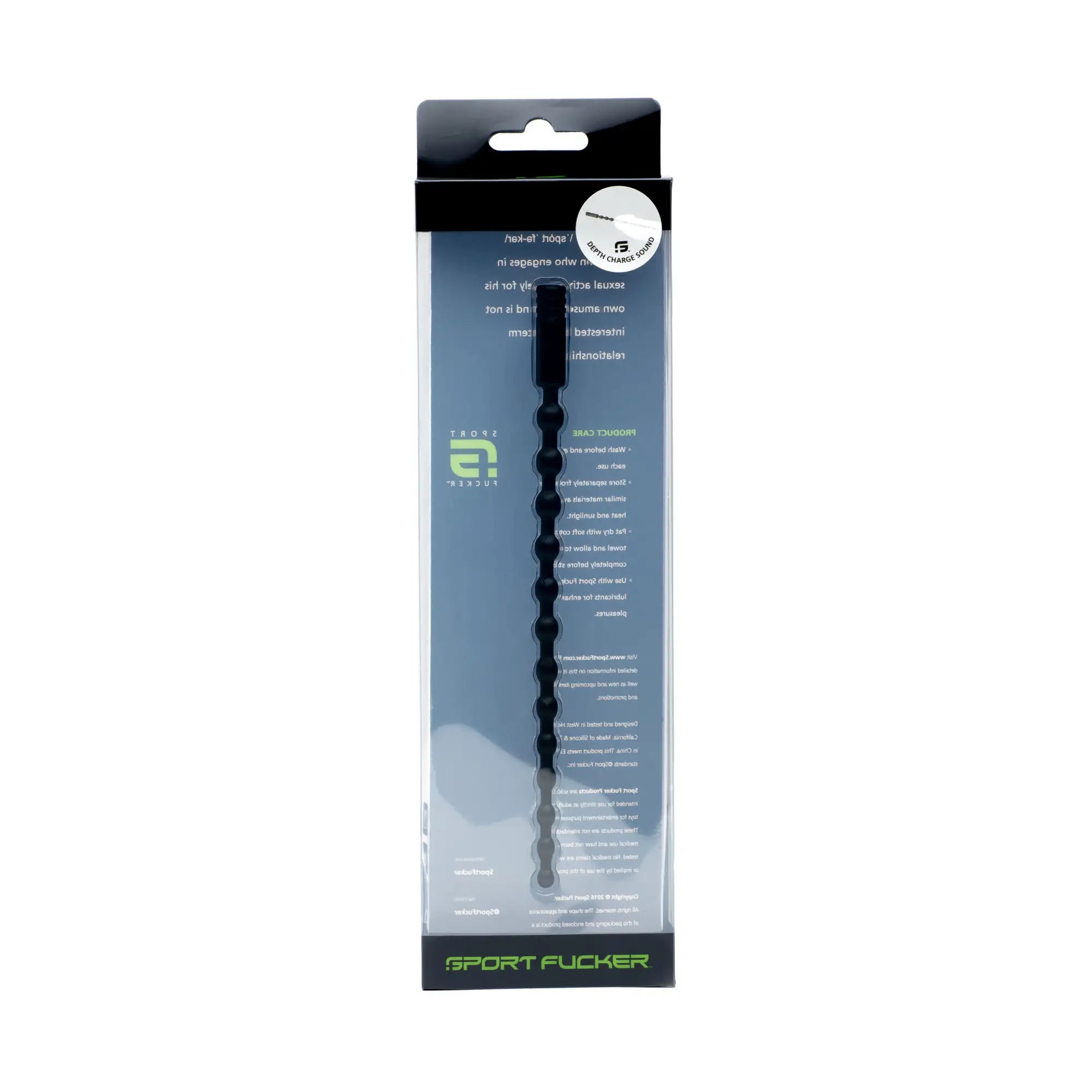 Black plastic sport fucker depth charge sound with textured ridges and tapered end in clear blister packaging