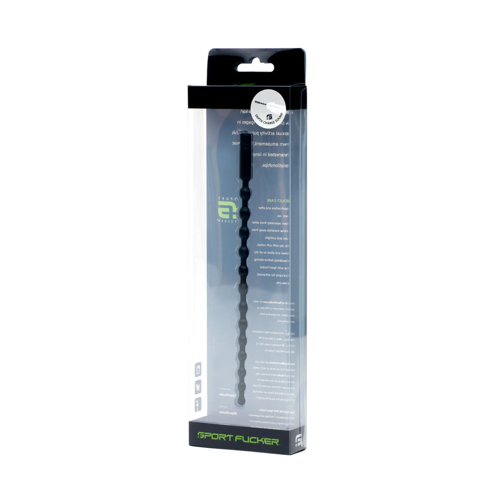 Black segmented plastic sport fucker depth charge sound toy in clear packaging with green branding and text