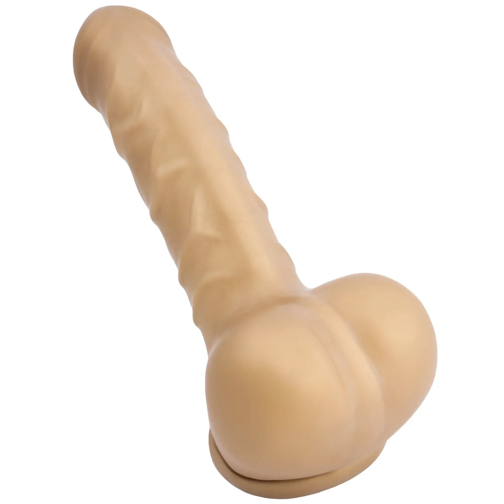 Beige silicone sport fucker franz latex cock sleeve gold with textured ridges and rounded bulbous base stress reliever