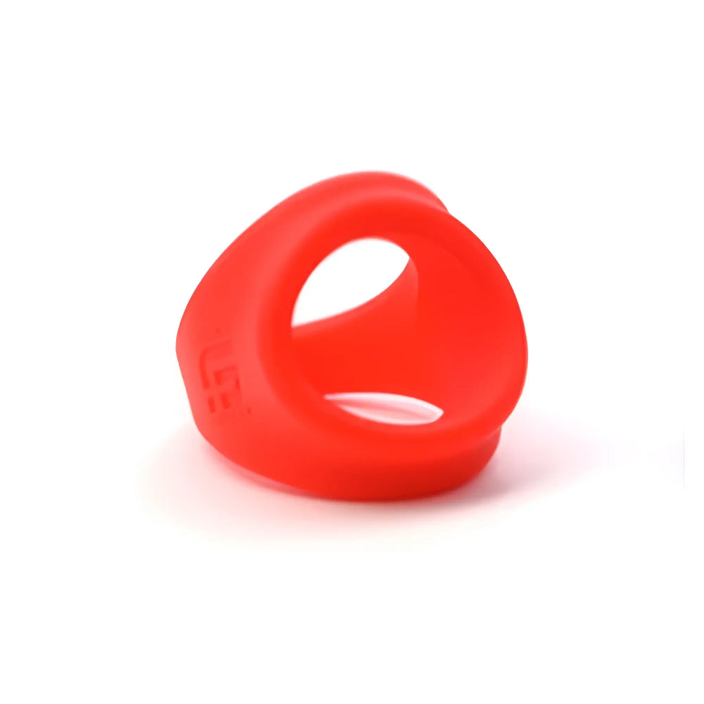 Bright red silicone sport fucker freeballer ring with smooth flexible texture and open center for comfortable wear