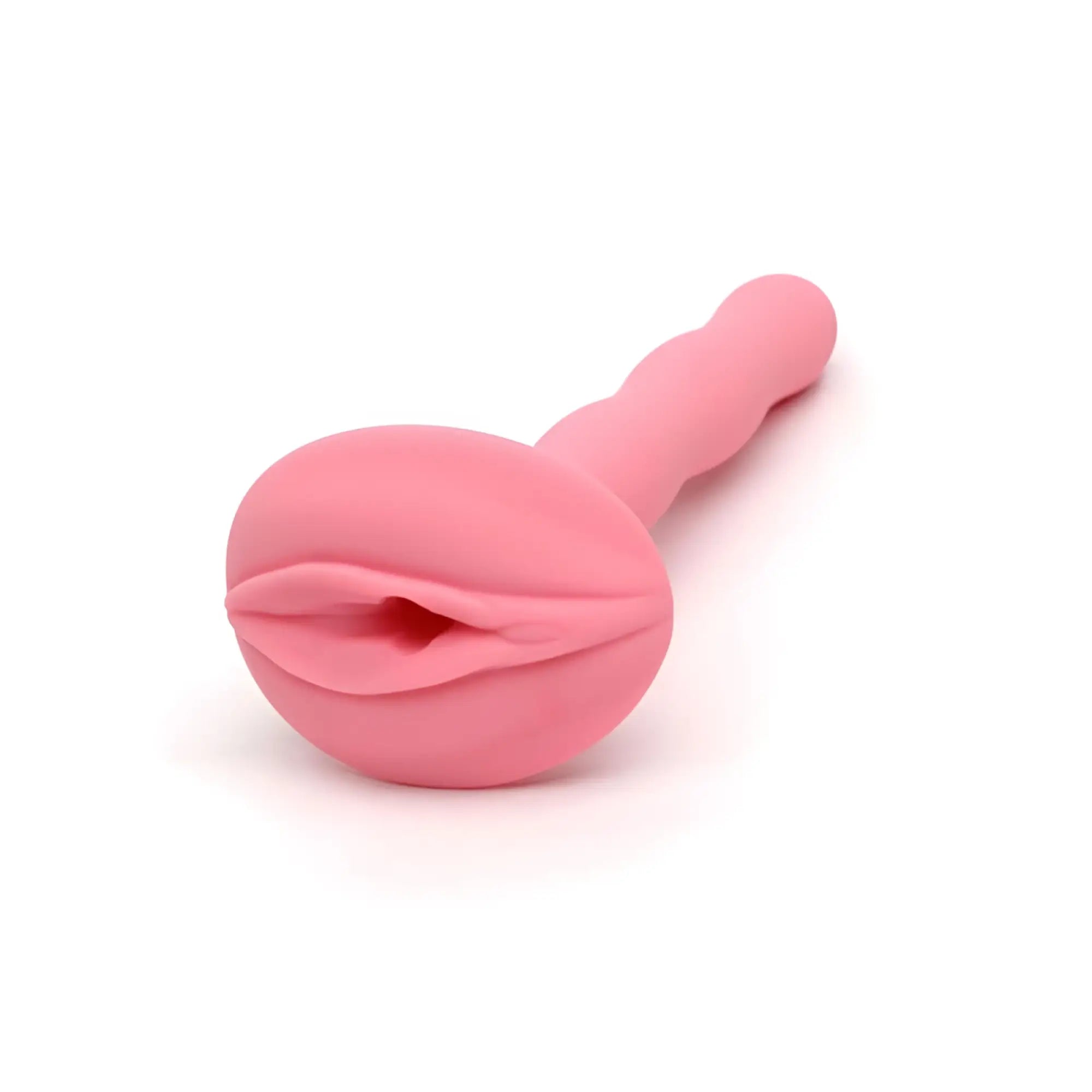 Pink silicone anal plug with rounded lip-shaped head and textured ridged shaft from sport fucker gladiator size 1 cock cage