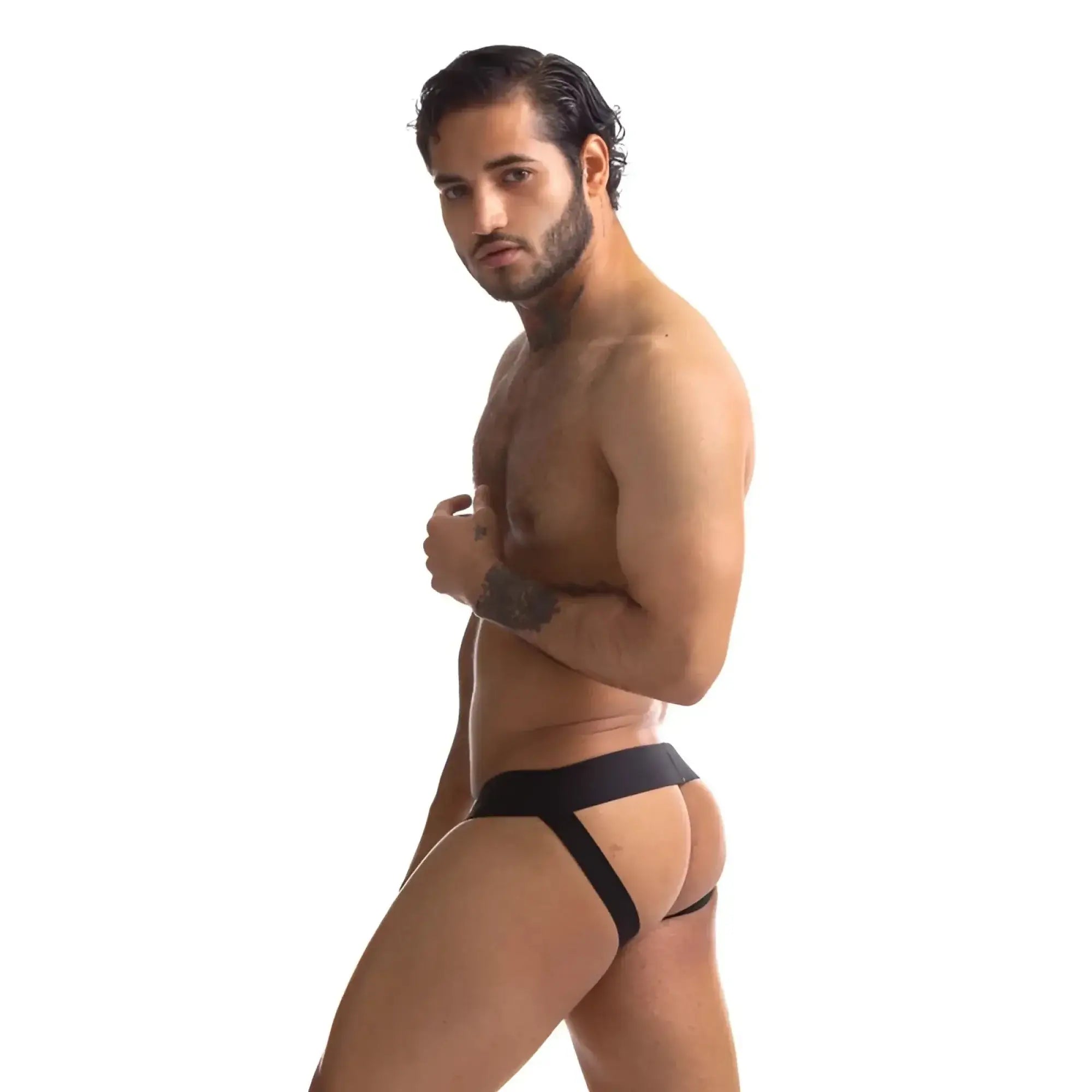 Black sport fucker jersey jockstrap in sleek form-fitting design with smooth elastic waistband and green accents