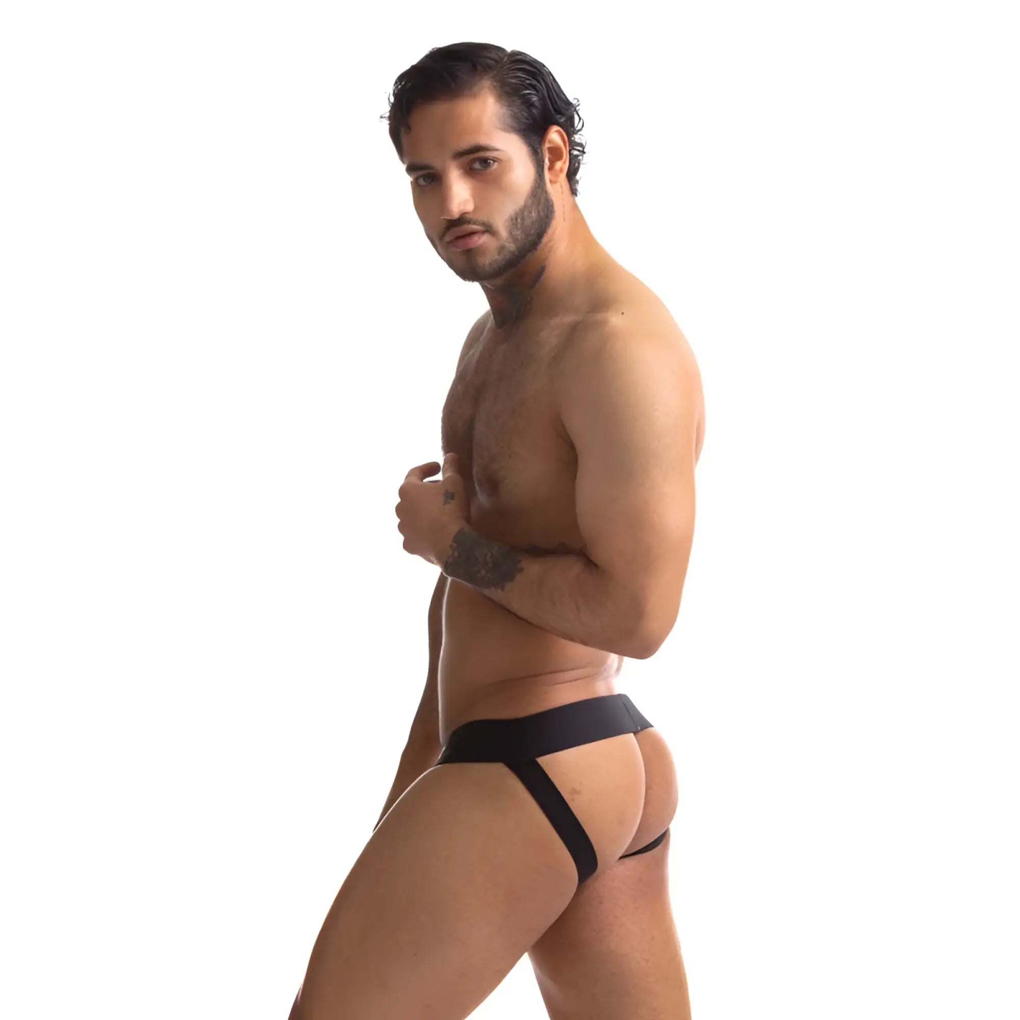 Black sport fucker jersey jockstrap in sleek form-fitting design with smooth elastic waistband and green accents