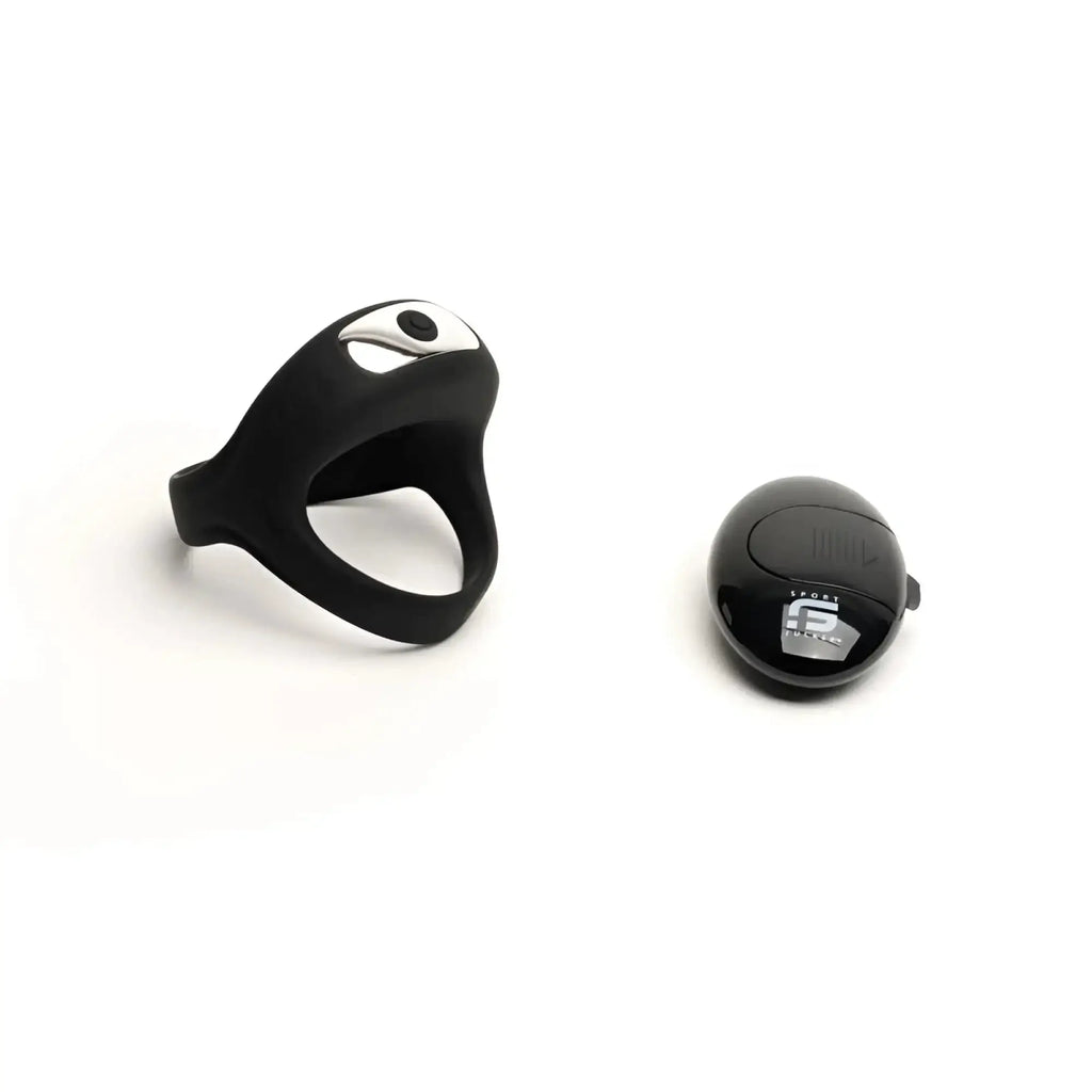 Black silicone sport fucker motovibe sling cock ring with silver accent and matching black oval remote control