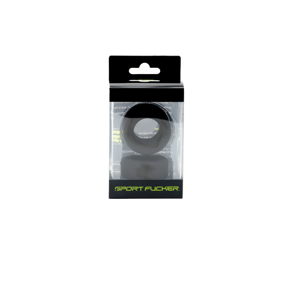 Black silicone sport fucker ring in clear packaging with green sport fucker branding from nutt job set by sport fucker black