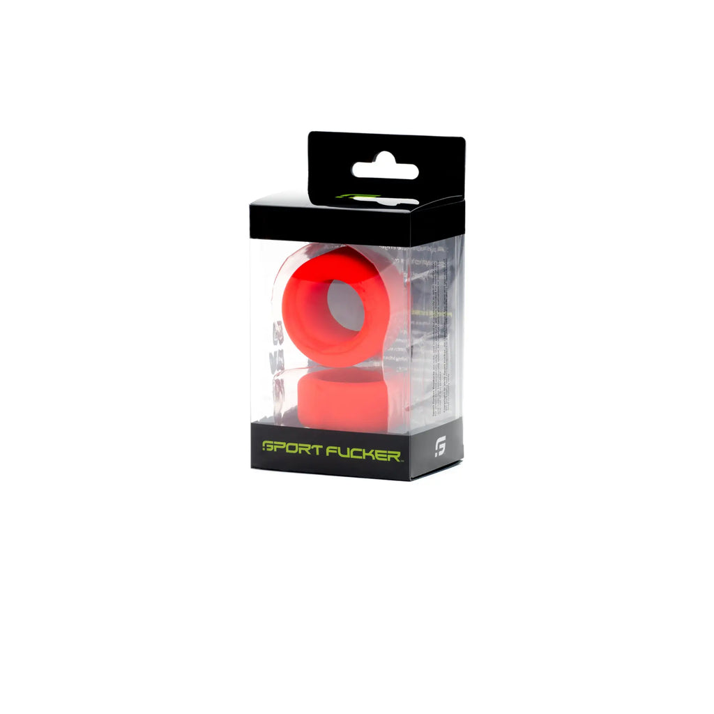 Bright red silicone ring set in a black and clear plastic package labeled sport fucker from the sport fucker nutt job set