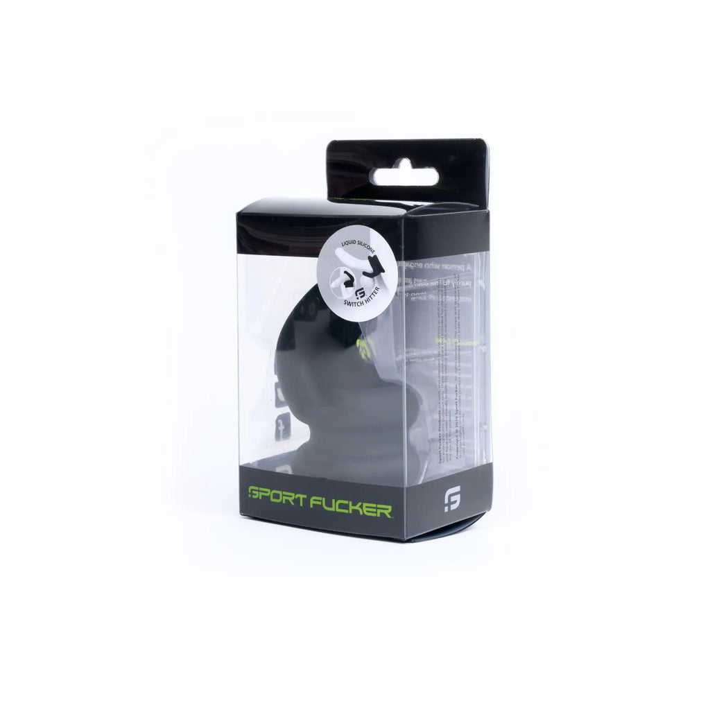 Black silicone liquid suction switch hitter in clear packaging with green branding by Sport Fucker