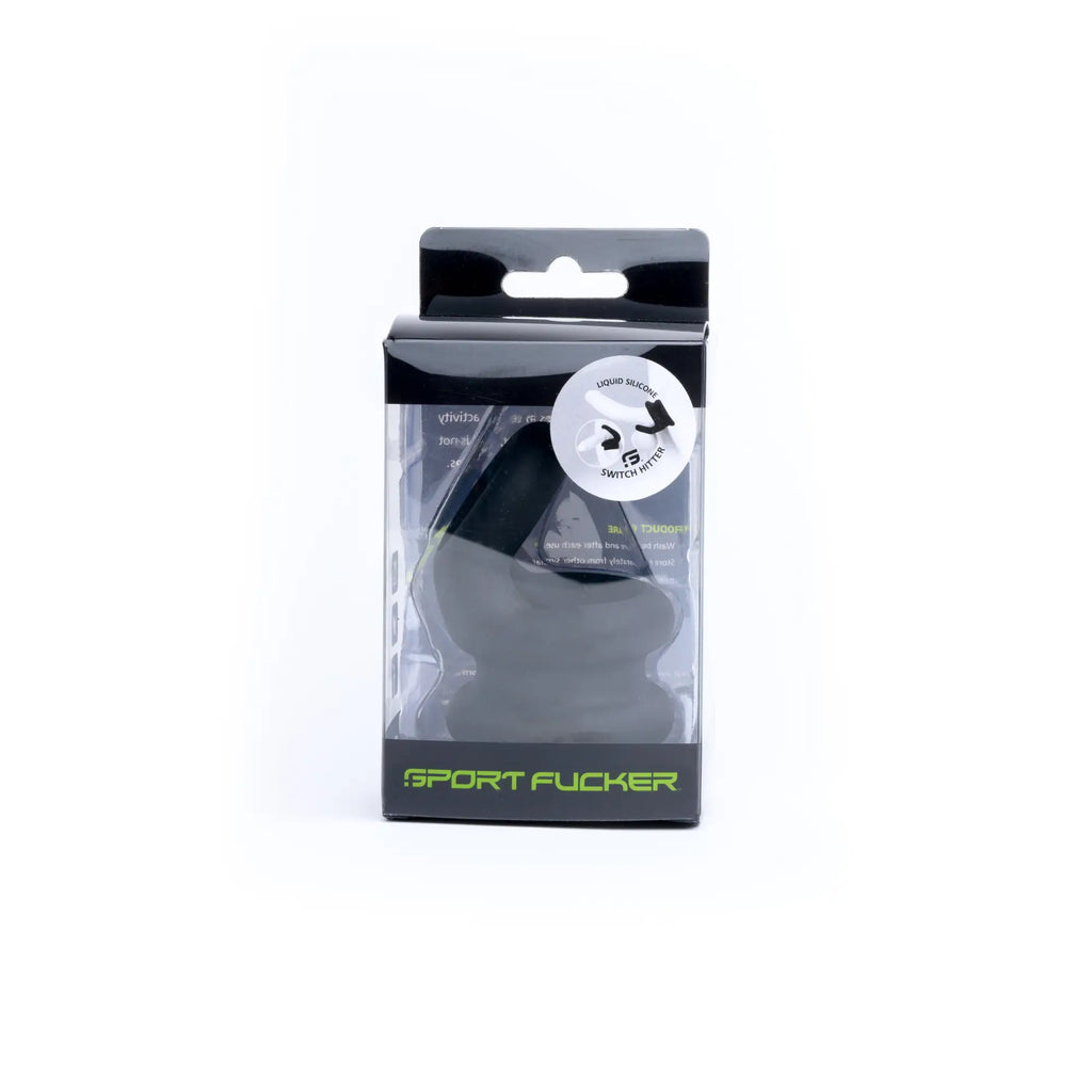Black silicone sports cock ring in clear plastic packaging with green Sport Fucker branding for active use