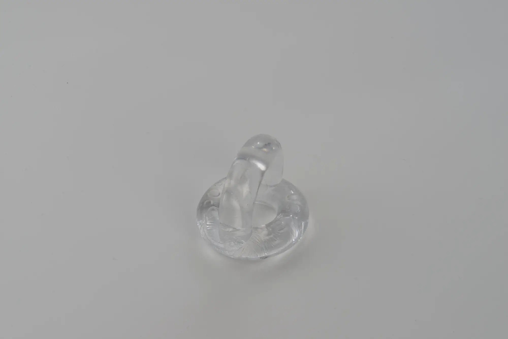 Clear transparent silicone earplug with rounded base and tapered top from sport fucker universal cockring clear collection