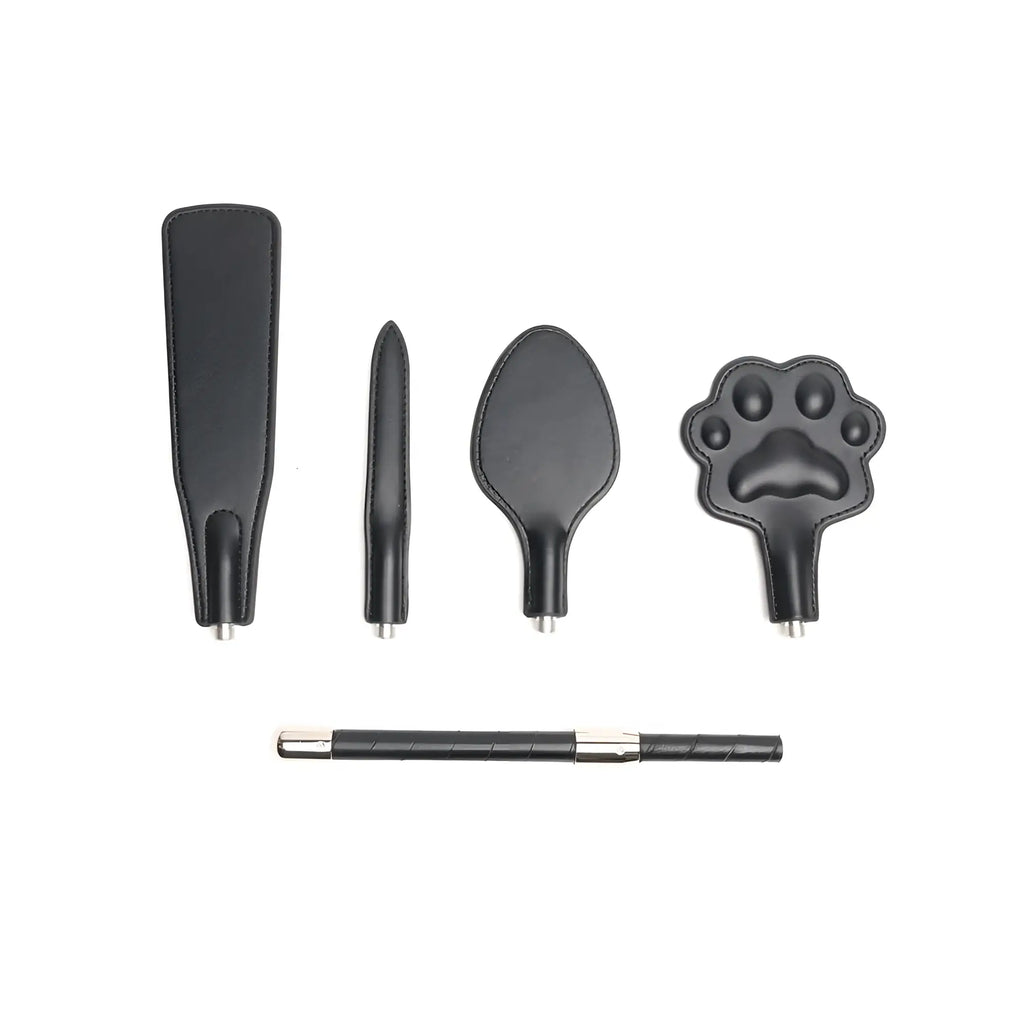 Set of black vegan leather training tools with metallic interchangeable tips and matching pen for sport use