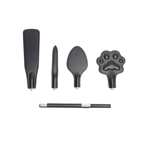 Set of black vegan leather training tools with metallic interchangeable tips and matching pen for sport use