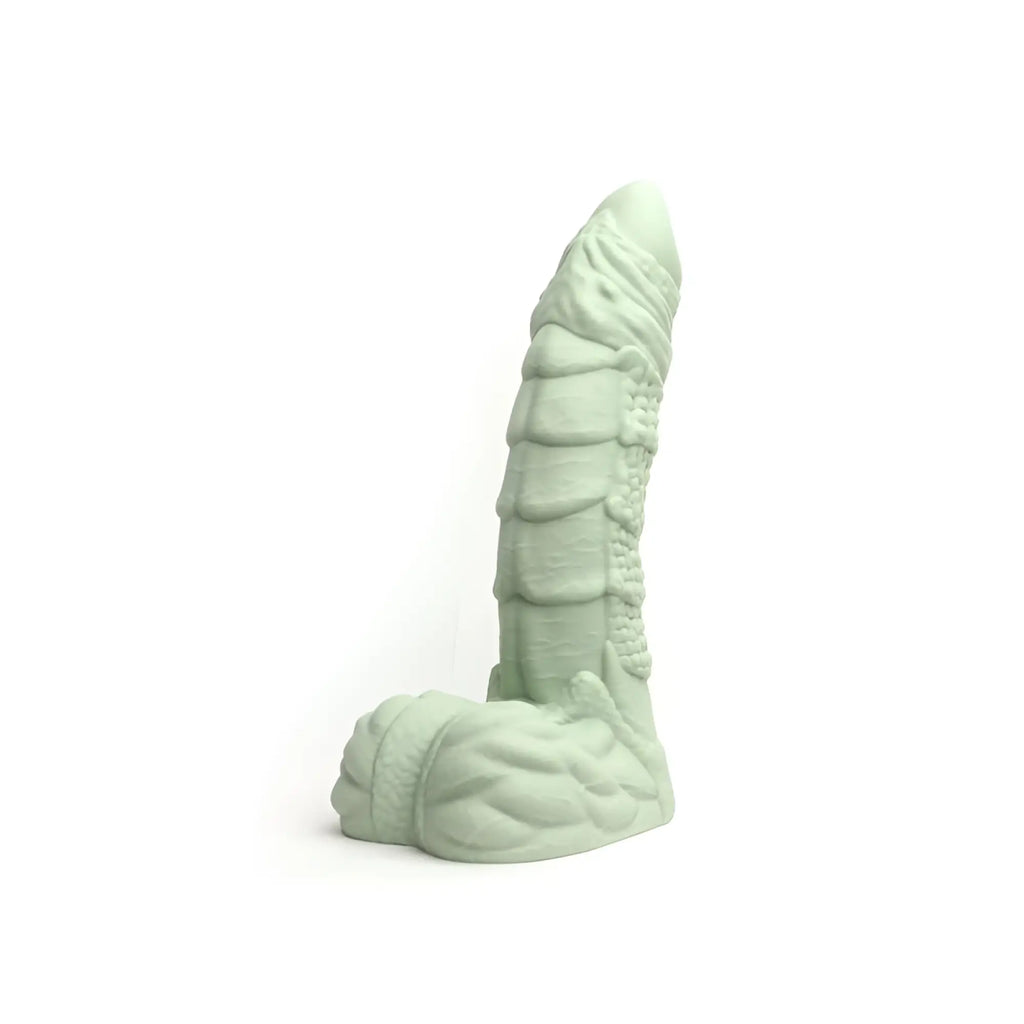 A pale green textured silicone dildo with detailed ridges and sculpted base sport fucker willie medium m