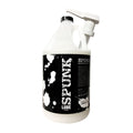 White plastic gallon jug of spunk lube hybrid with black and white splatter design label for lubrication use