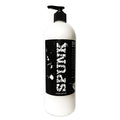 White plastic bottle with black pump dispenser labeled spunk for spunk hybrid lube 32oz 946ml