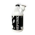White plastic gallon jug with black pump dispenser and black-and-white splatter spunk lube label for hybrid lube 64oz