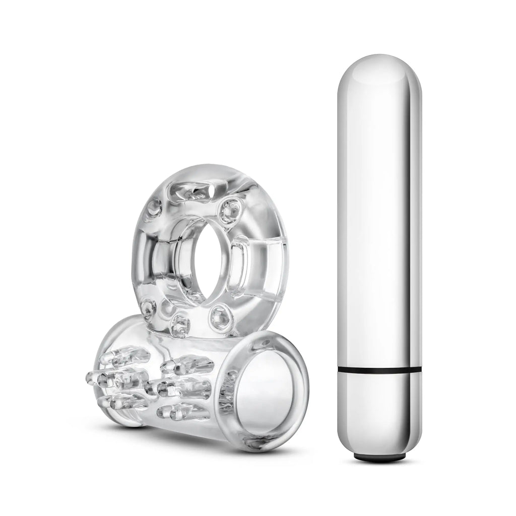 Clear silicone vibrating mega bull ring with textured grip and beads paired with sleek silver cylindrical remote