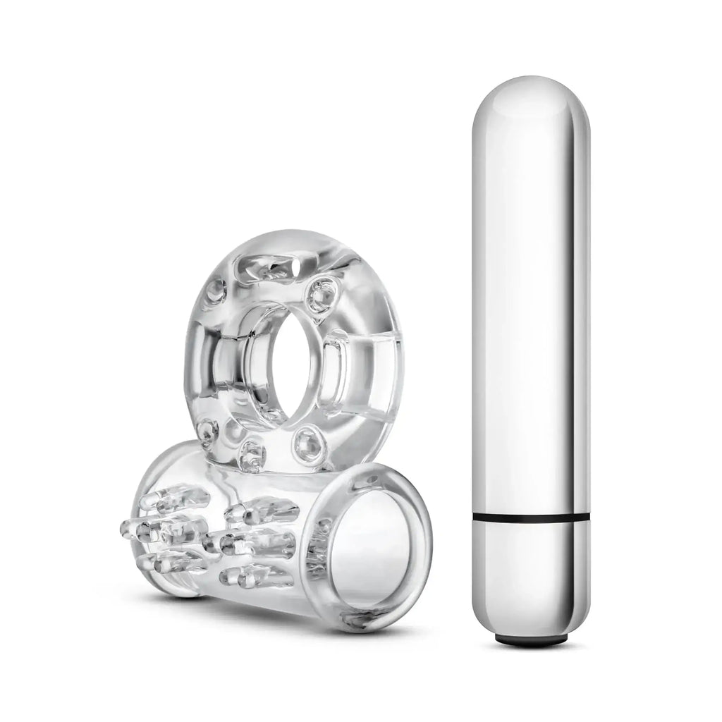 Clear silicone vibrating mega bull ring with textured grip and beads paired with sleek silver cylindrical remote