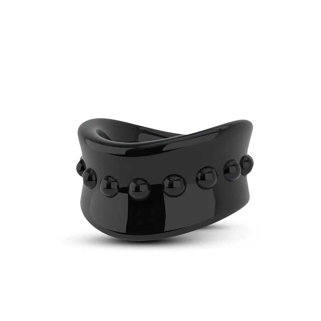Black glossy ceramic stay hard beef ball stretcher with curved wide band and spaced spherical beads for snug fit