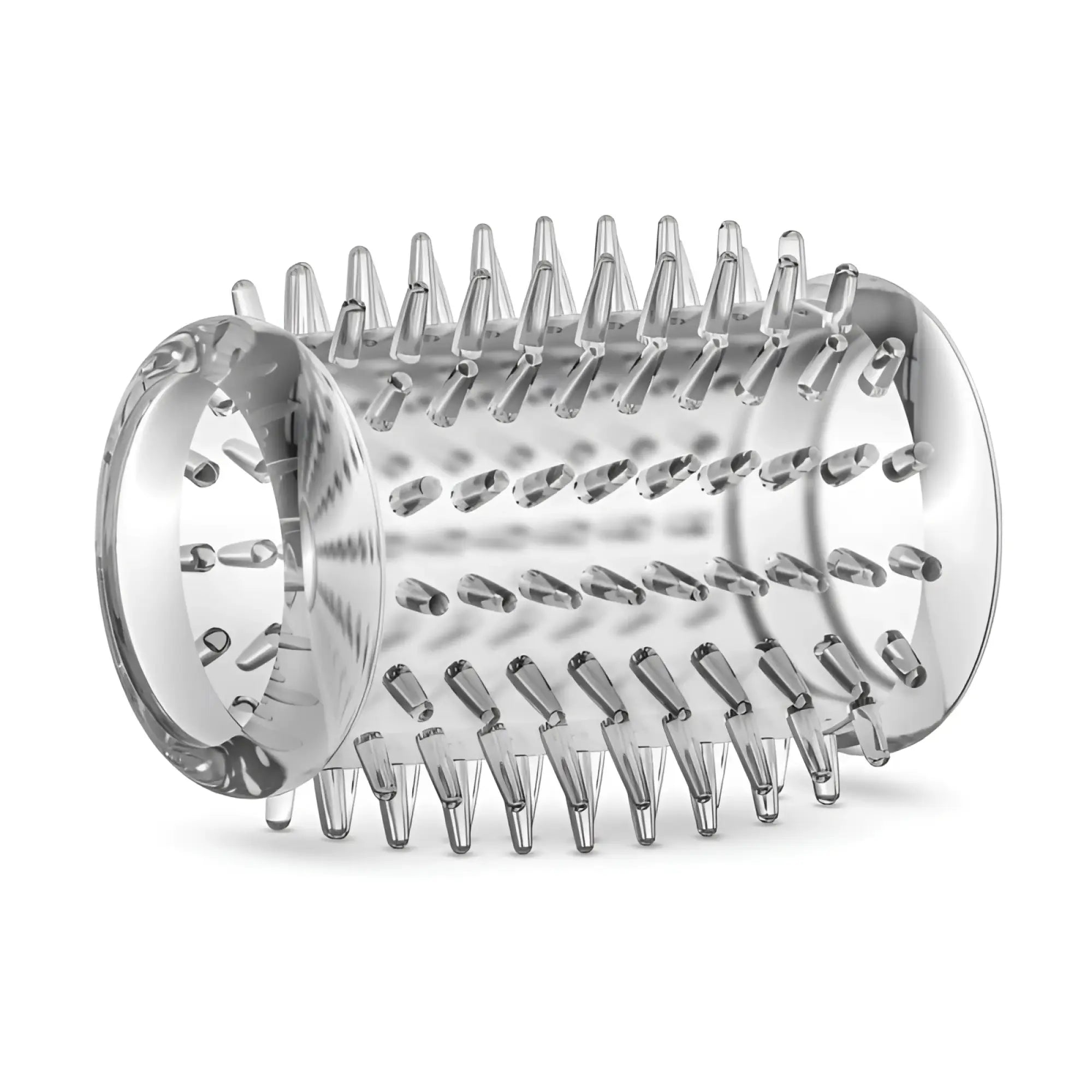 Clear cylindrical massage roller with evenly spaced translucent plastic spikes in stay hard cock sleeve kit