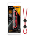 Red silicone double loop cock ring with black circular adjustment buttons from Stay Hard for enhanced performance