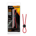 Red stay hard silicone loop cock ring with a black circular release button for secure fit and comfort