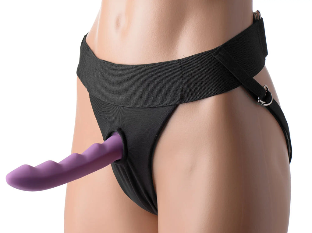 Black fabric strap u avalon jock style strap on harness with purple textured dildo inserted in opening