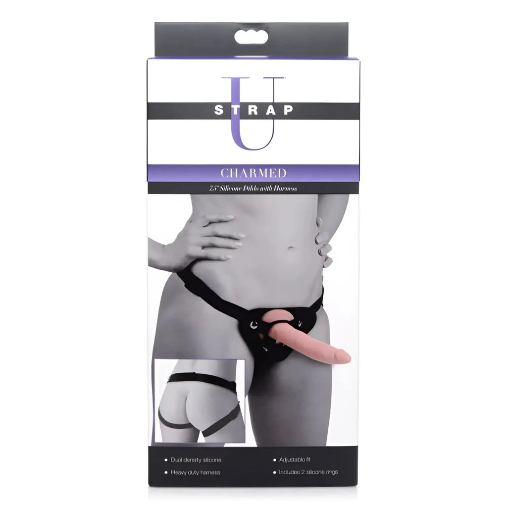 Pink 2.5-inch silicone dildo with black harness from strap u charmed for hands-free pleasure use