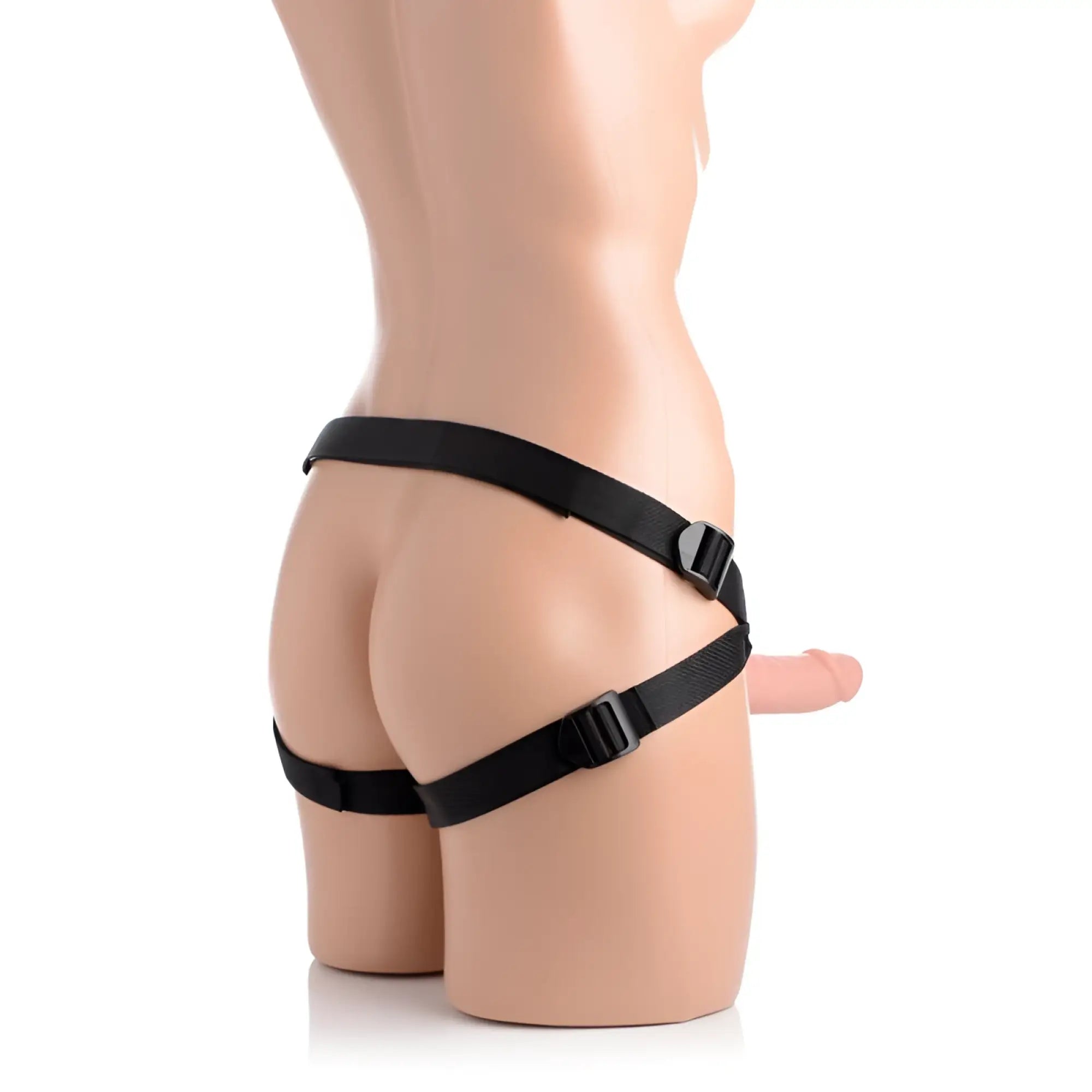 Black adjustable harness with plastic buckles for strap u seducer 7 inch silicone dildo flesh shown from back side