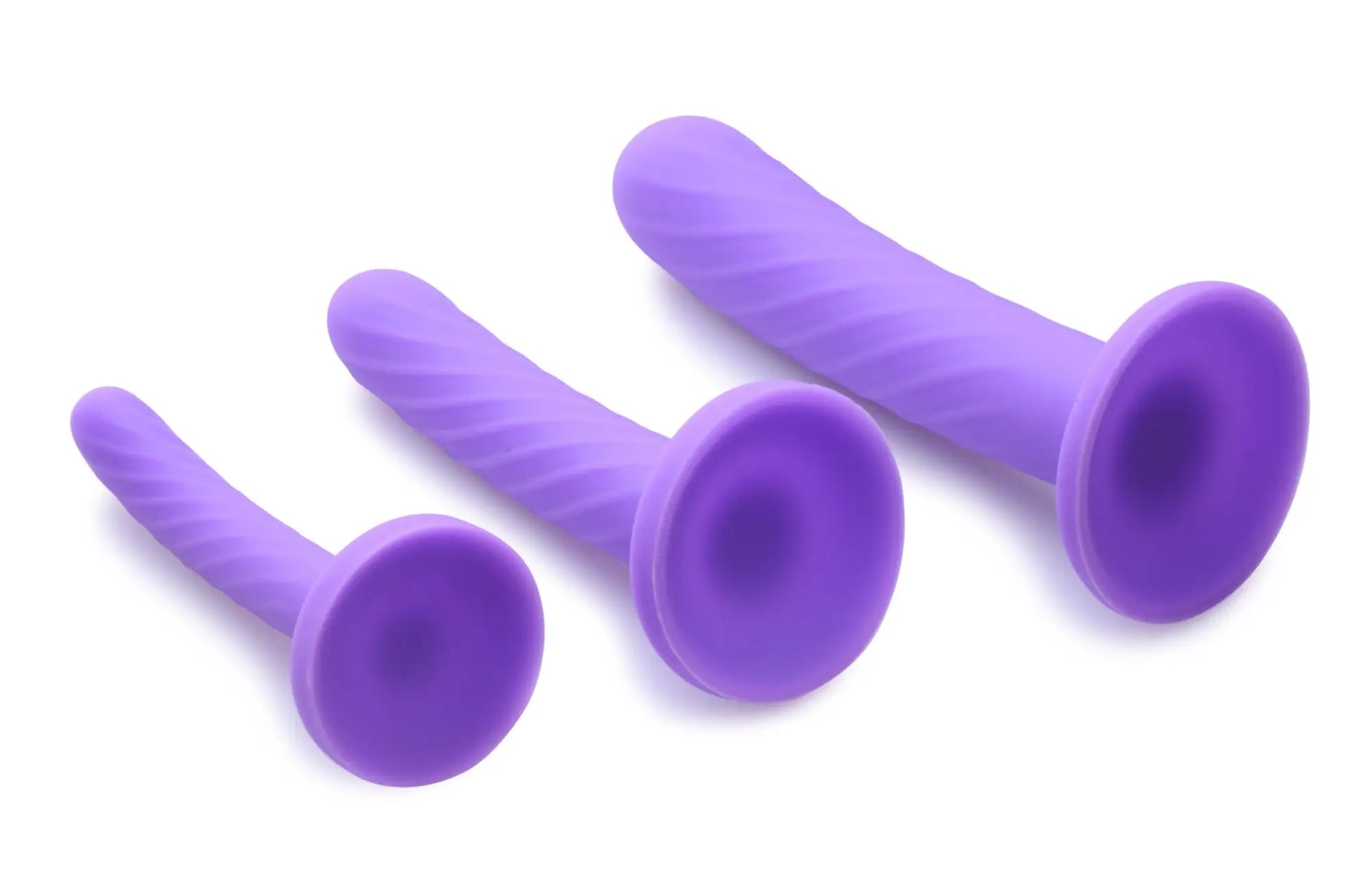 Set of three purple silicone suction cup dildos with textured tapered bodies from strap u tri-play set