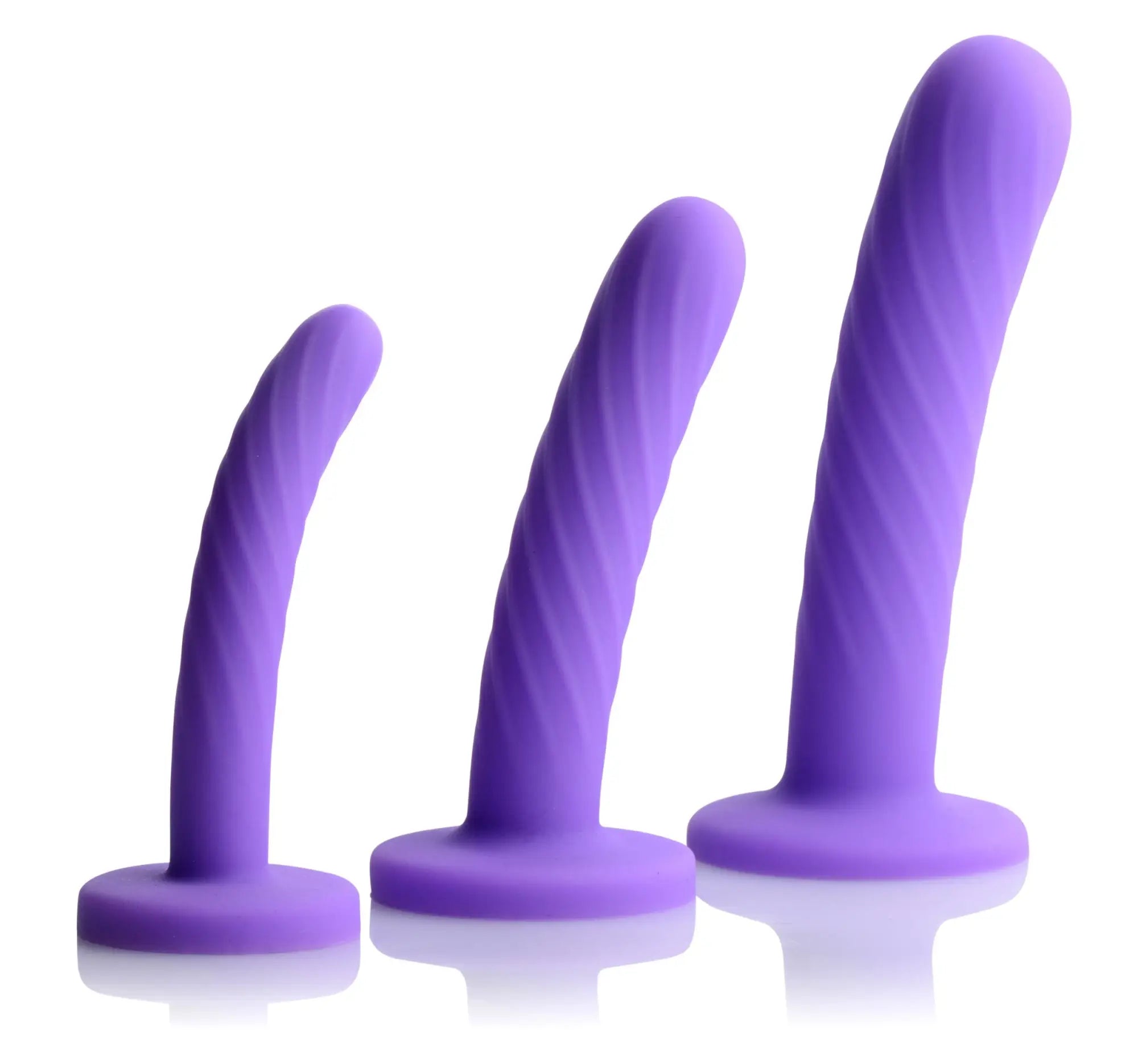 Set of three purple silicone vibrators with spiral texture and rounded bases from strap u tri-play dildo set