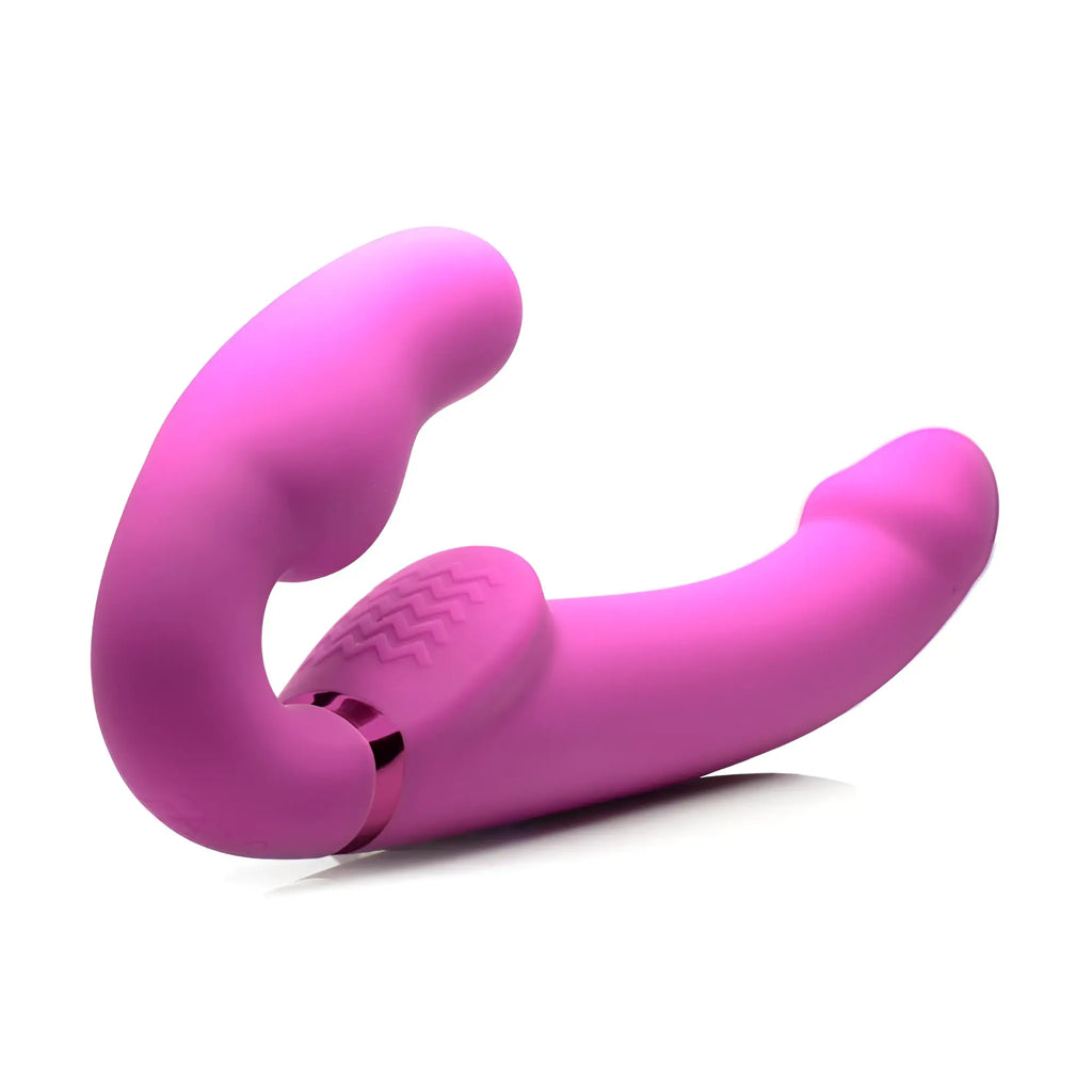 Pink silicone dual-headed vibrator with textured grip and metallic ring for strap u remote control inflatable strapless strap-on