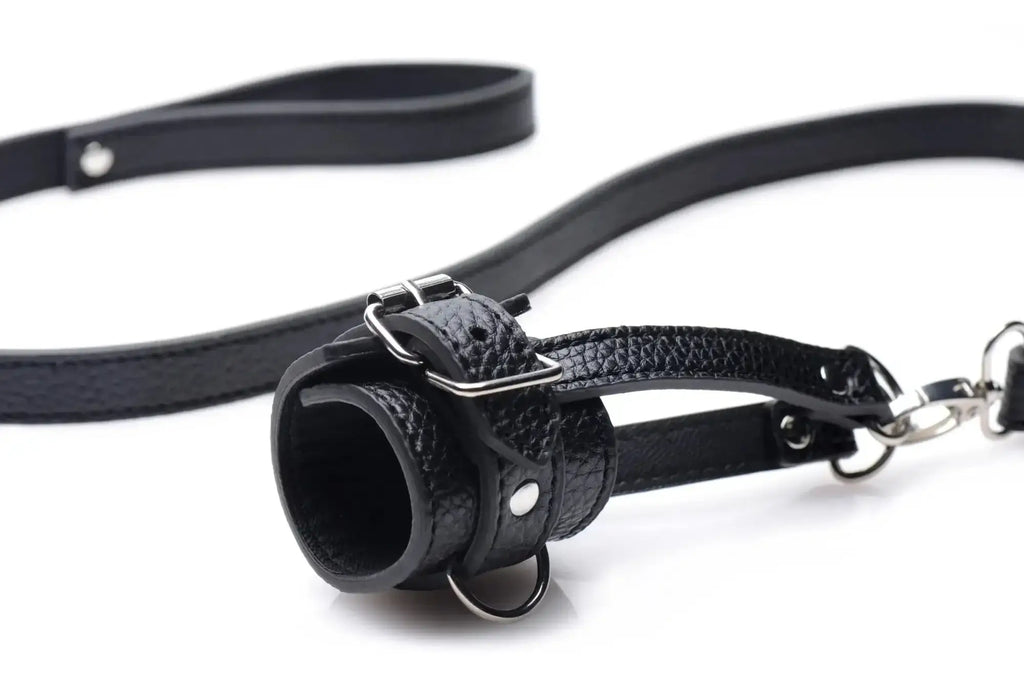 Black leather strict strict ball stretcher with textured surface silver buckle and chain leash for secure wear