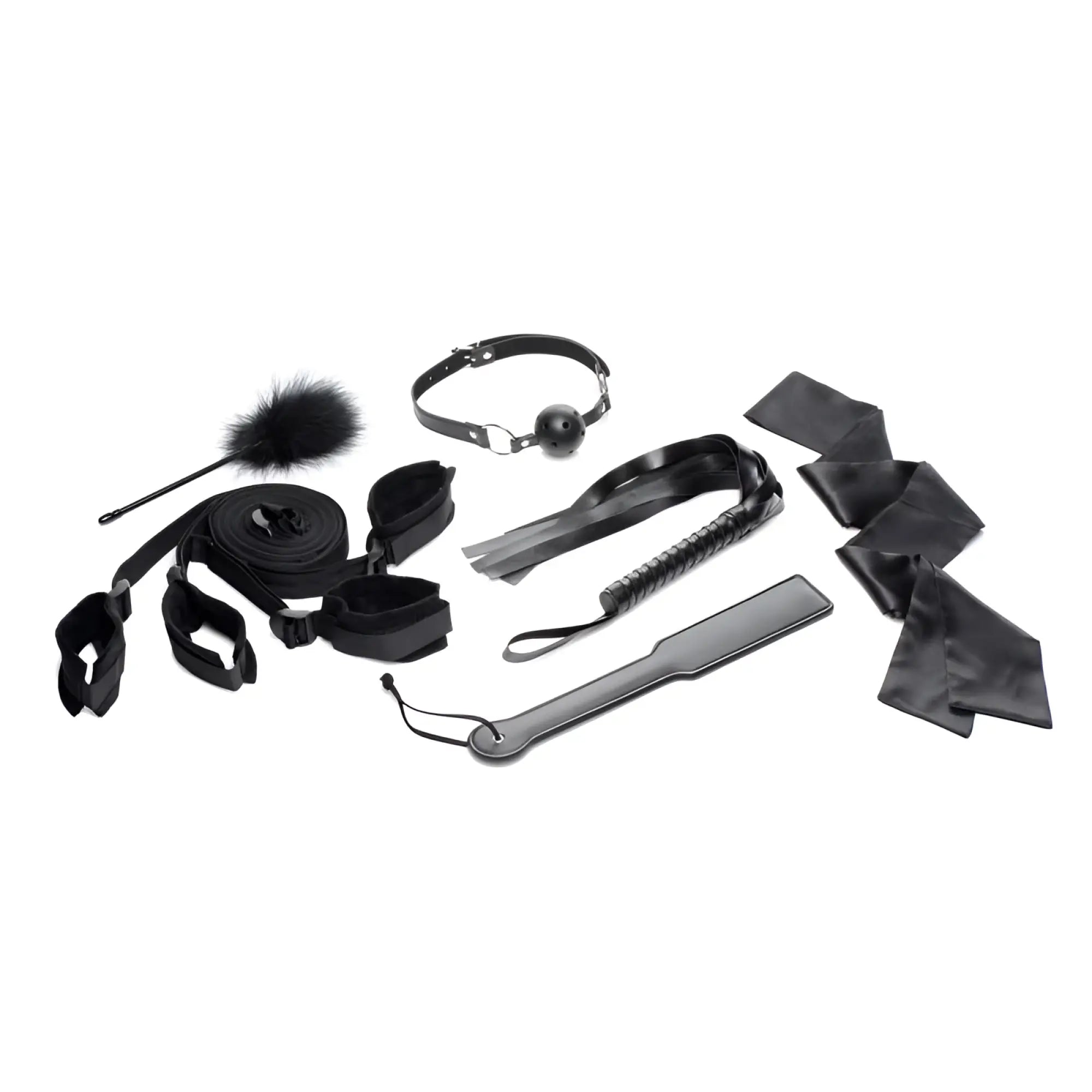 Black leather bondage kit with assorted restraints whip and accessories for strict bed restraint play