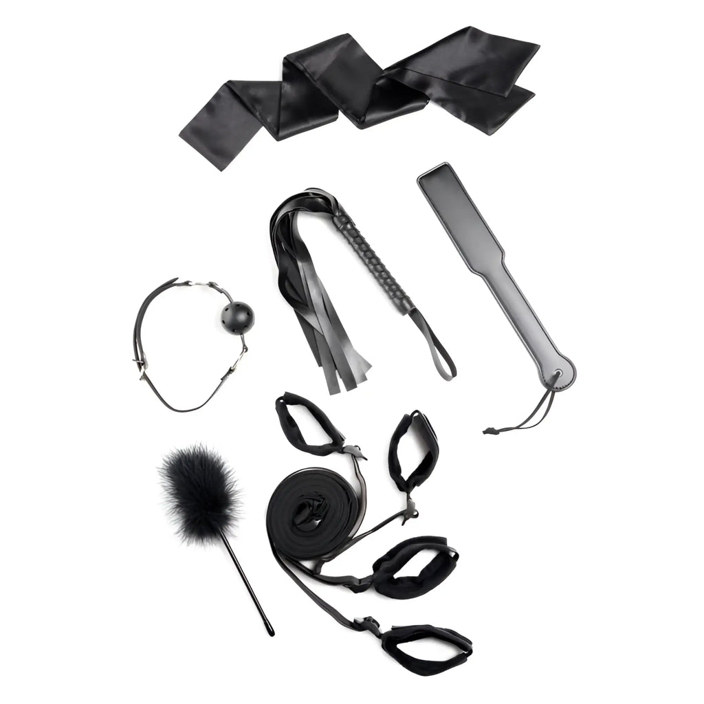 Black satin ribbon with smooth glossy finish and neatly folded edges in strict bed restraint bondage kit black